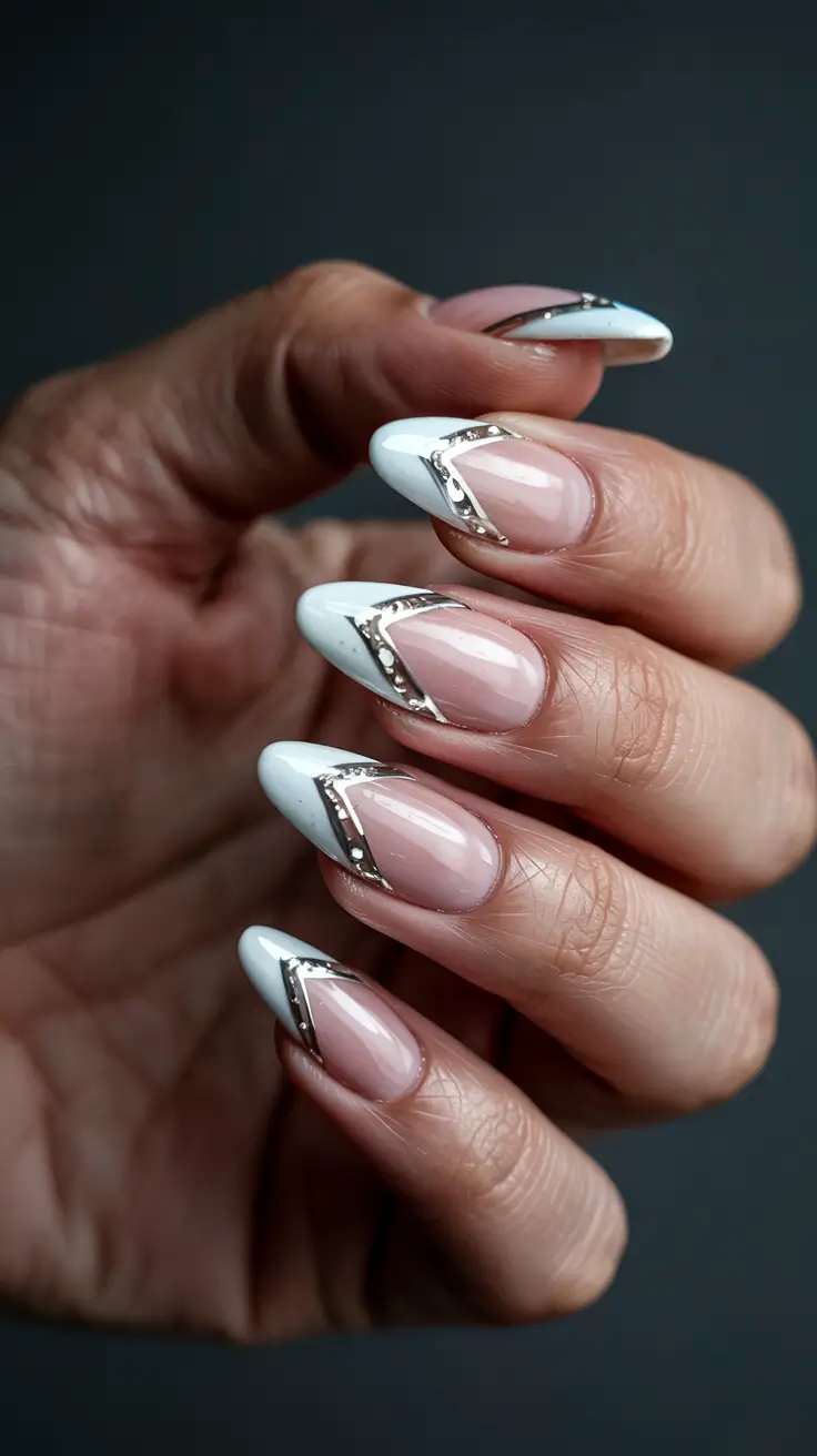 winter nails inspo 2025 Frosted White Geometry with Metallic Edges