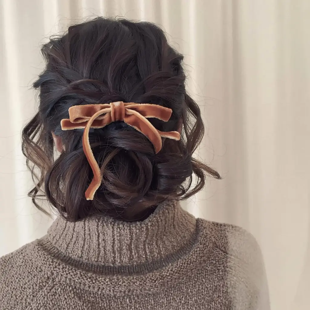 cute winter hairstyles Velvet Bow Updo