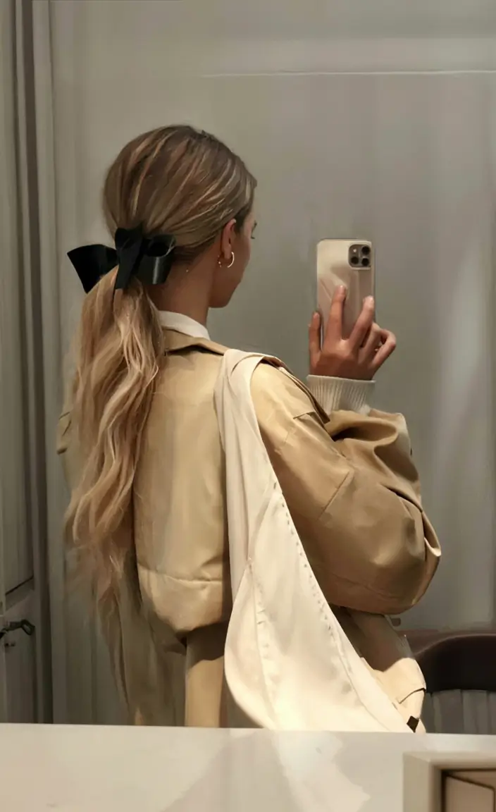 cute winter hairstyles Low Ribbon Ponytail