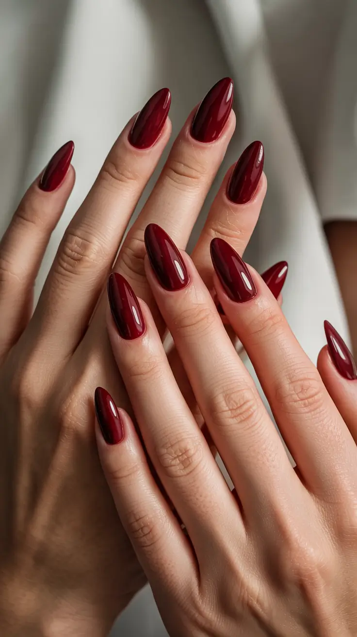 winter almond nails 2025-2026 Deep Ruby Elegance