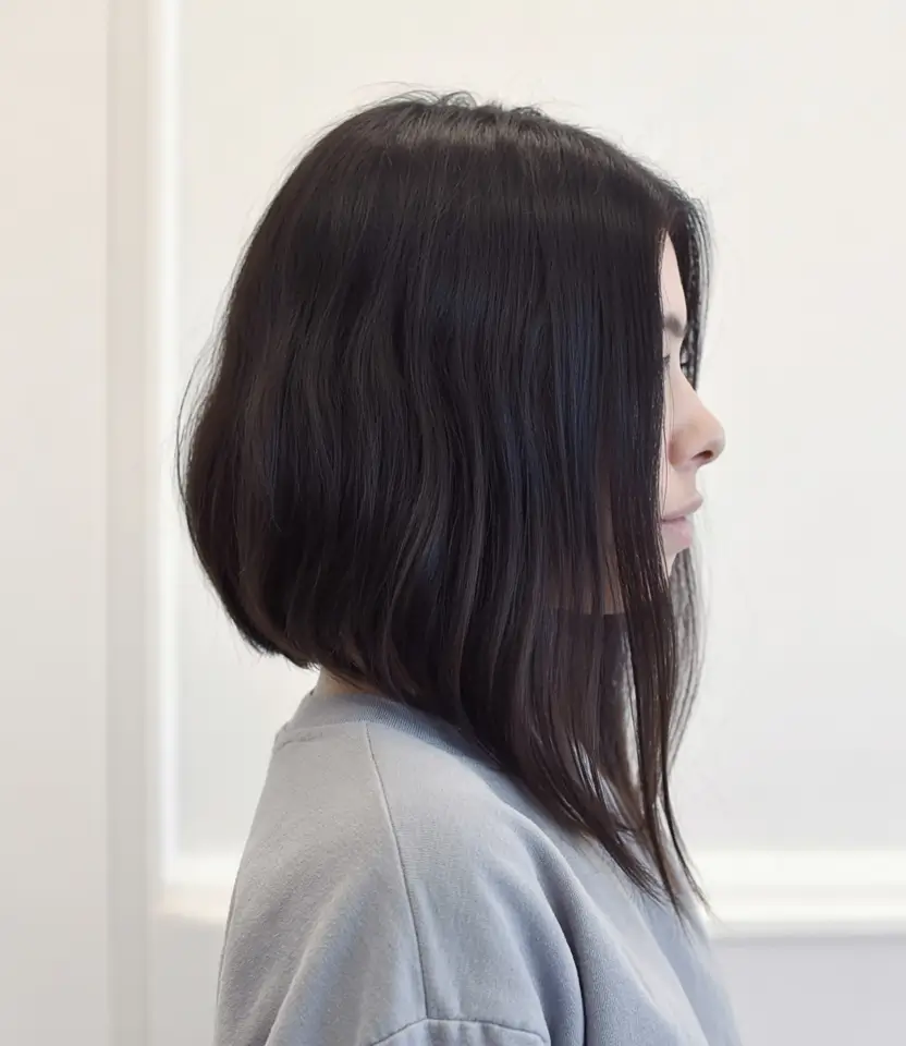 choppy bob haircuts 2026 Sharp Angled Midnight Bob