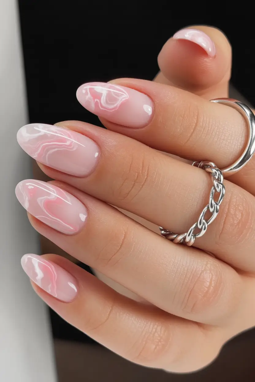 light pink nails 2026 Marble Pink Waves With An Almond Glow