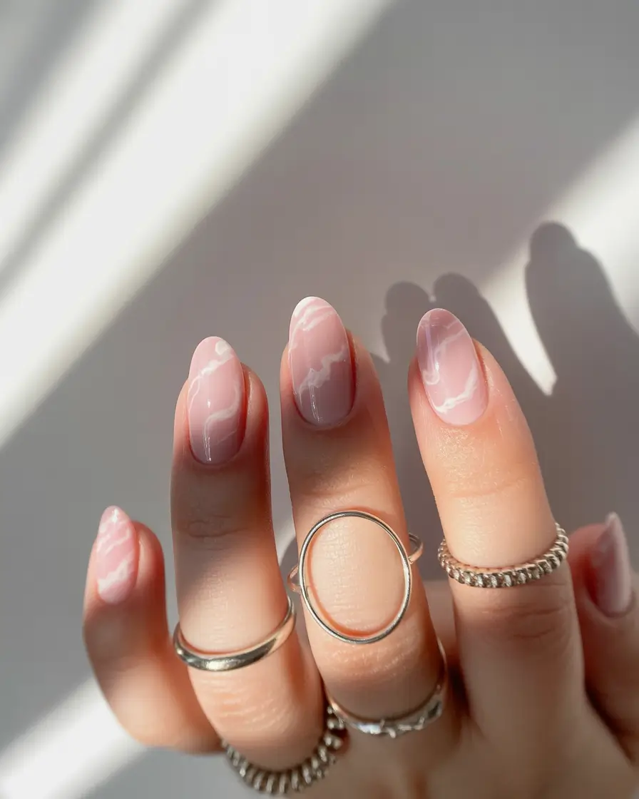 february nails designs 2026 Soft Marble Blush Nails