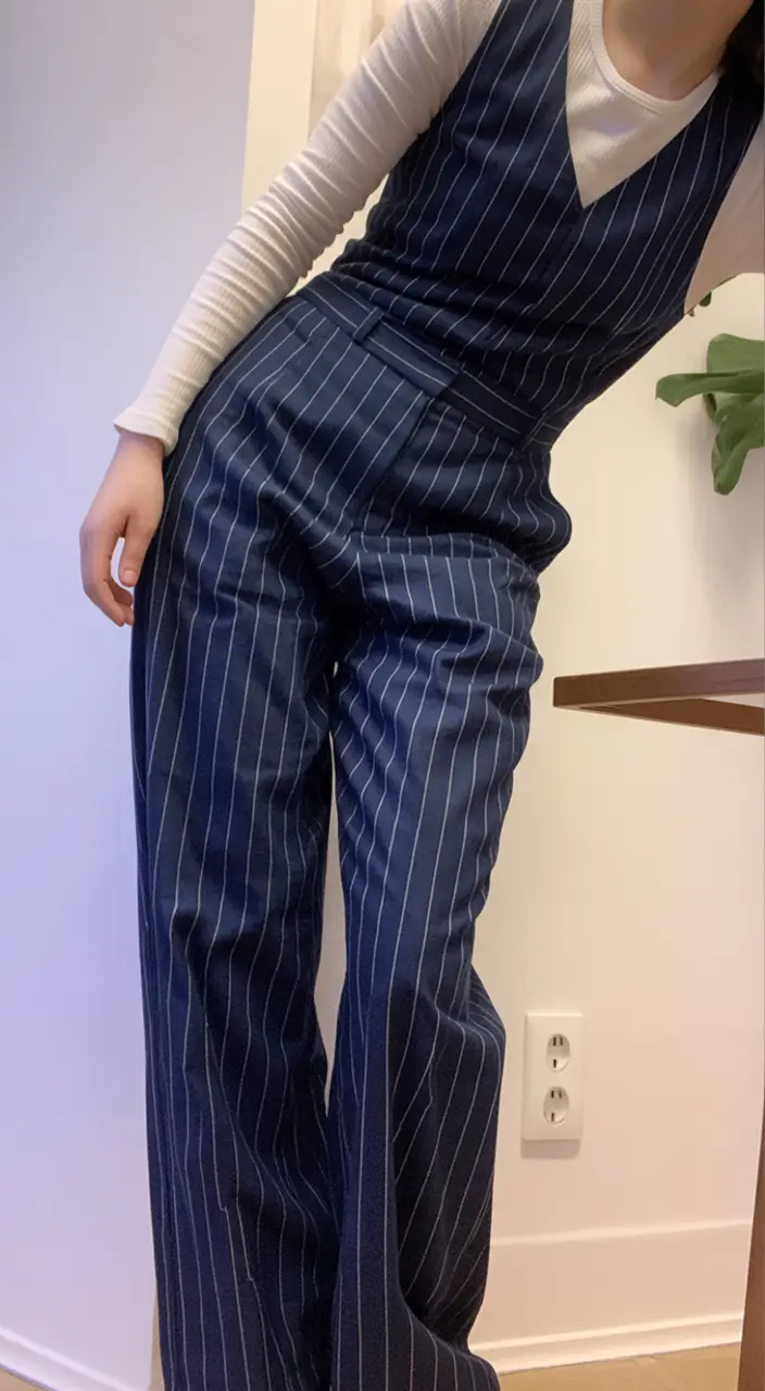 trending spring outfit for Wednesday 2026 Pinstripe Jumpsuit Elegance for a Sharp Spring Reset