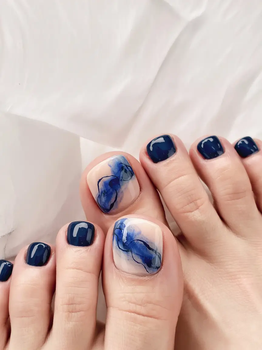 creative spring toe nails 2026 Deep Blue Marble Accent for Modern Spring Drama