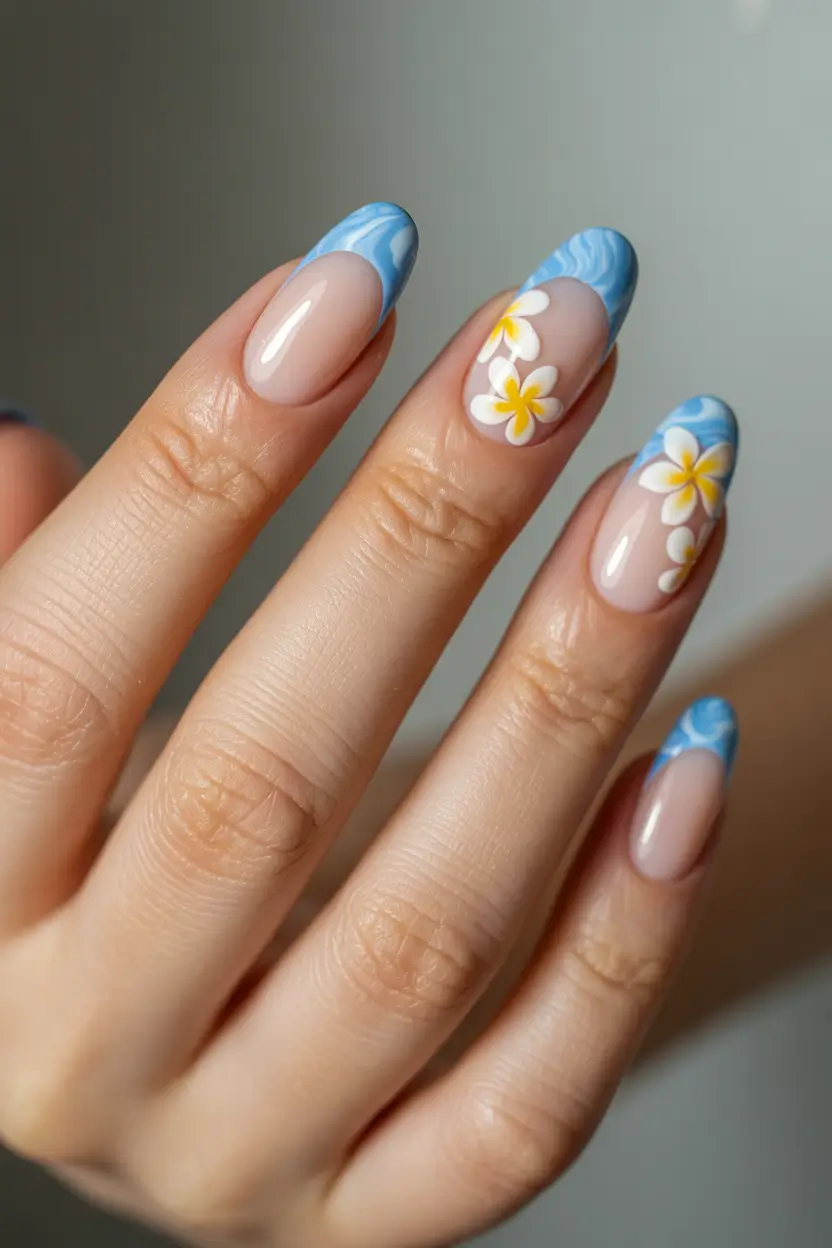 fresh spring vacation nails 2026 Sky Blue French Florals for a Beach Escape