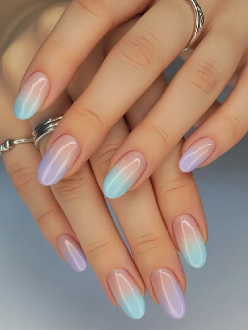 fresh spring vacation nails 2026 Pastel Blue and Lilac Ombre Almond