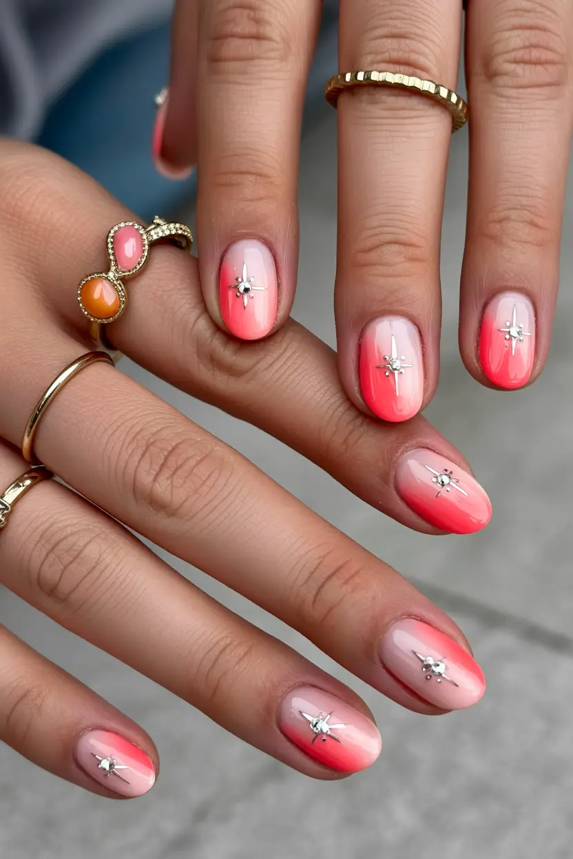fresh spring vacation nails 2026 Coral Ombre Sparkle for Bright Getaways