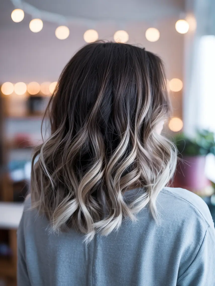 new spring balayage hair color 2026 High Contrast Ash Blonde Balayage on Shoulder Length Waves