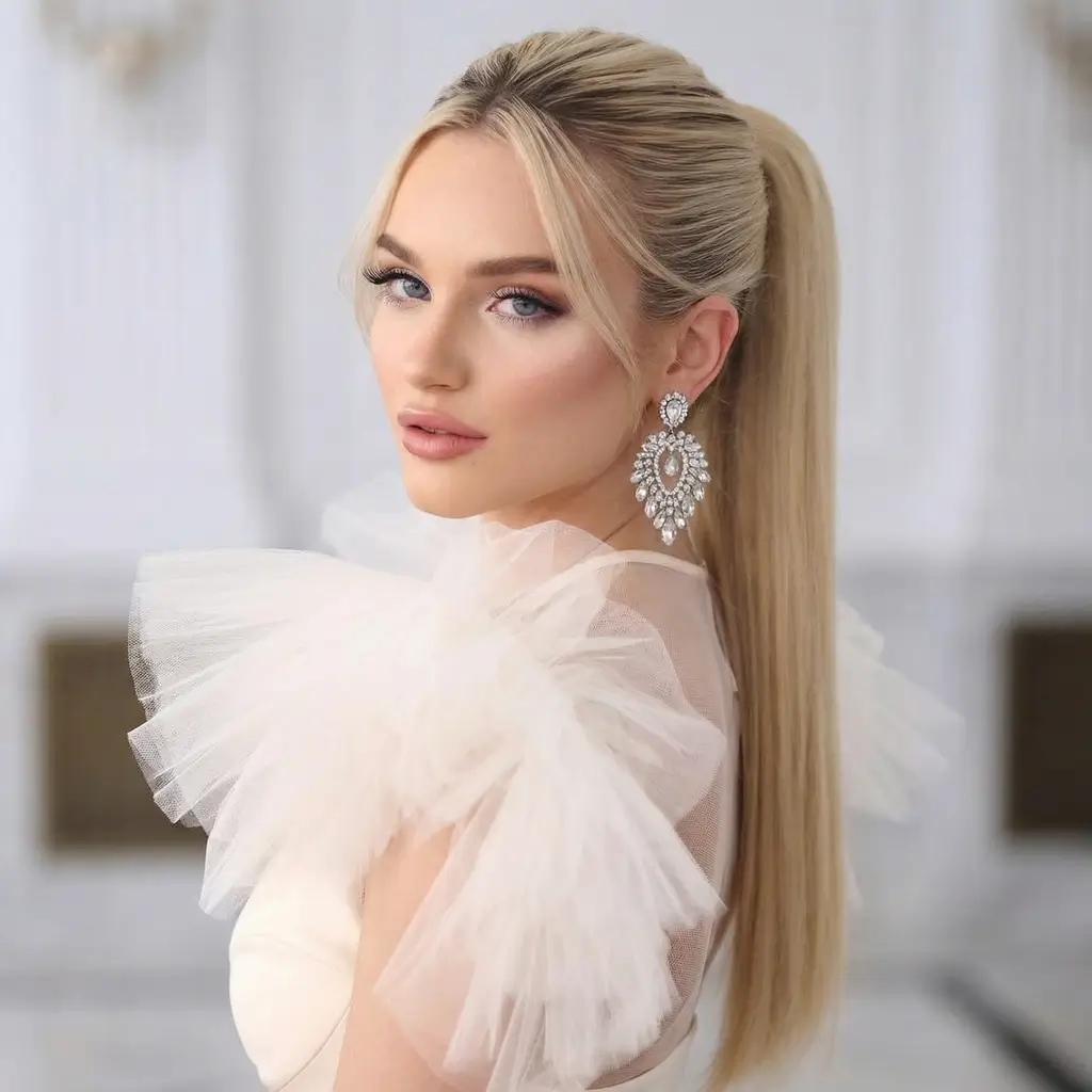 quick spring hairstyles 2026 Sleek High Pony With Soft Curtain Pieces