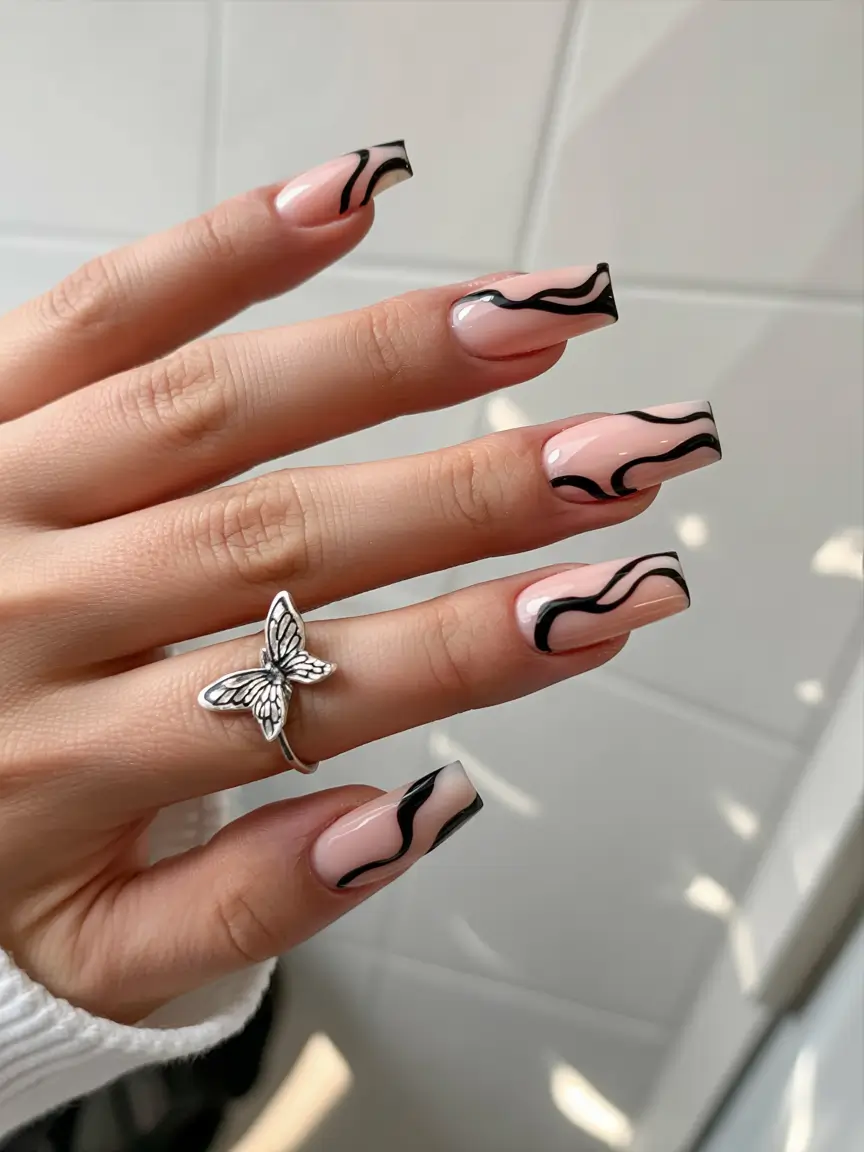 spring gel nails art ideas 2026 Modern-Black-Wave-Tips-for-a-Sleek-and-Stylish-Spring-Edge