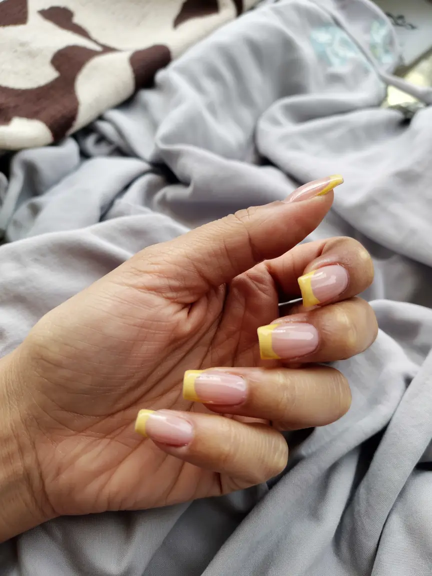 spring gel nails art ideas 2026 Soft-Yellow-French-Tips-for-a-Gentle-Spring-Refresh