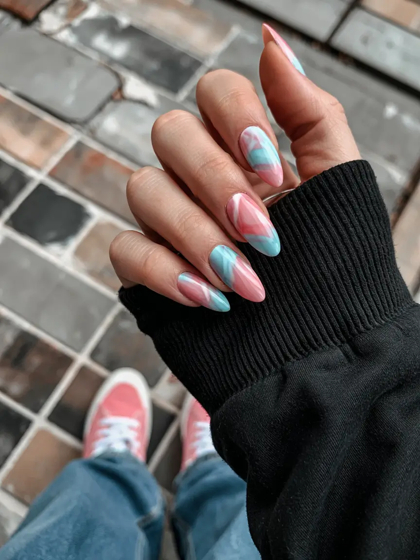 spring gel nails art ideas 2026 Soft-Pink-and-Blue-Abstract-Swirl-Nails-for-a-Playful-Spring-Mood