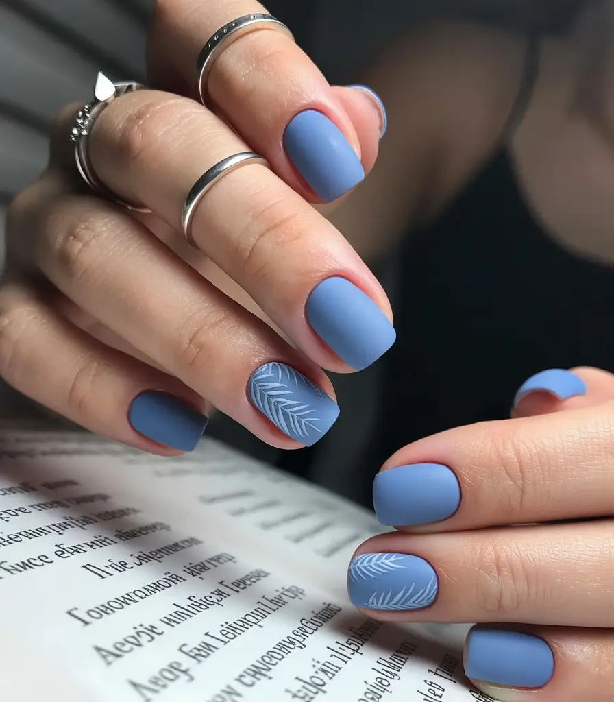 April nails ideas 2026 Soft blue spring square manicure with delicate leaf art