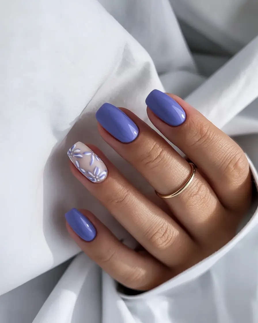 April nails ideas 2026 Soft lavender spring nails with delicate floral accent