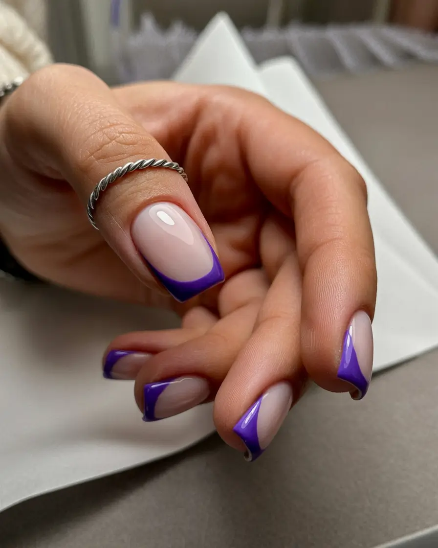 April nails ideas 2026 Modern purple french tip manicure with almond shape