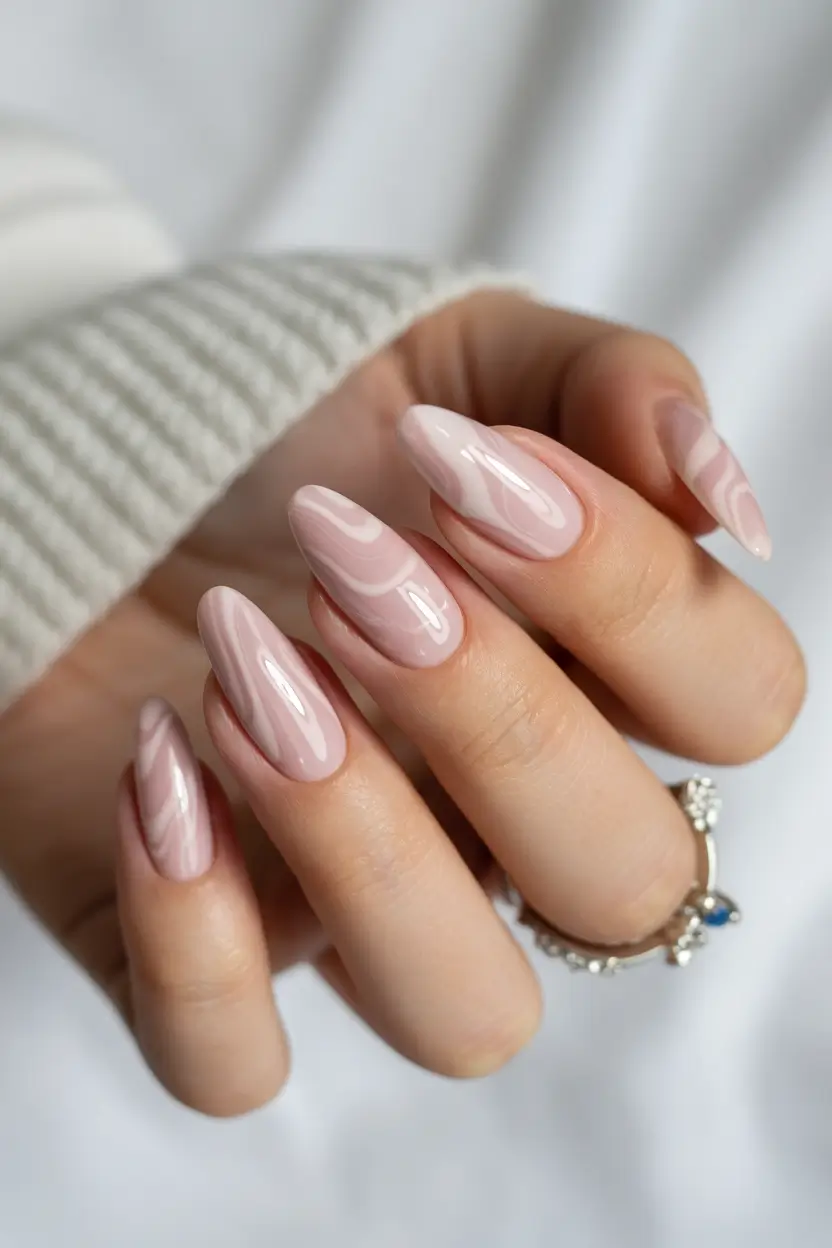 April nails ideas 2026 Elegant nude marble almond nails