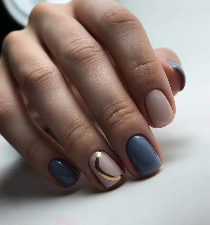 cute easter nail art ideas Soft Blue Minimalist Nails with a Golden Crescent Accent