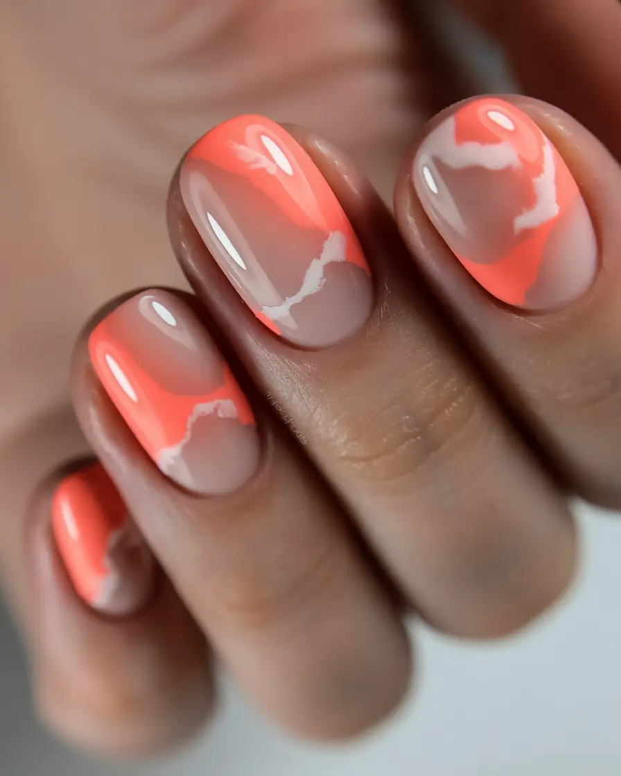easter nails ideas 2026 Glossy Coral Spring Cloud Nails