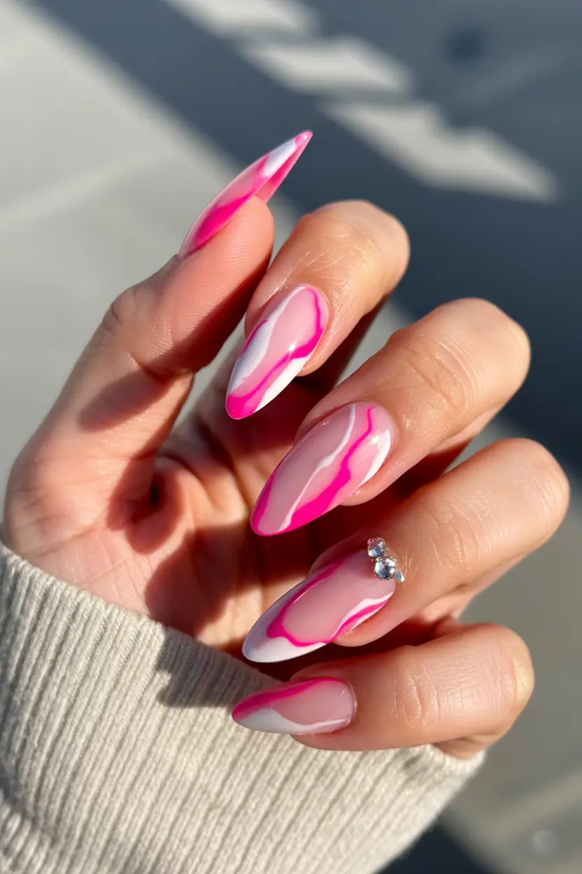 glam spring hot pink nails 2026 Abstract Hot Pink Waves with Crystal Accent