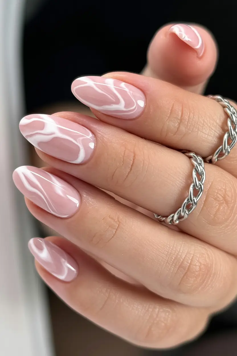 graduation nail color ideas 2026 Milky pink marble swirl manicure