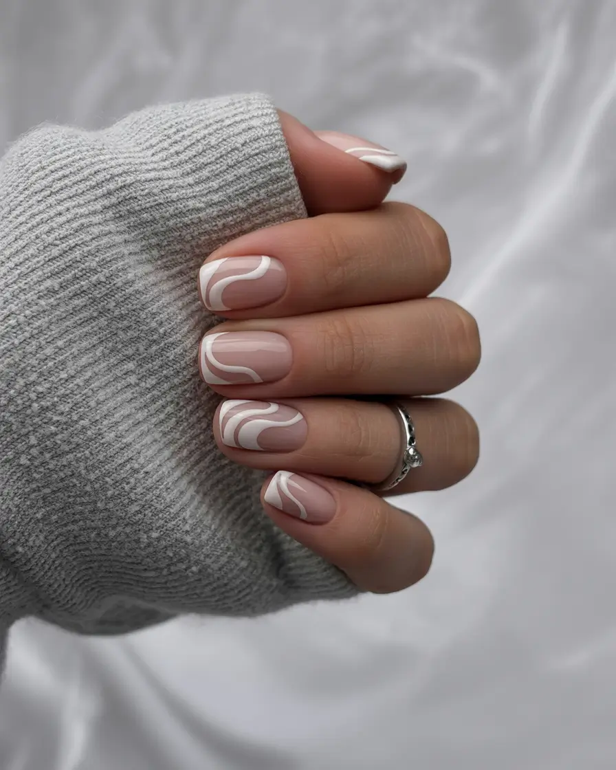 graduation nails ideas 2026 Minimal White Swirl Nails for Modern Graduation Looks