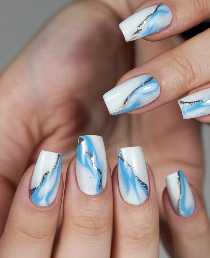 graduation nails ideas 2026 Blue Marble Graduation Nails with Silver Detail