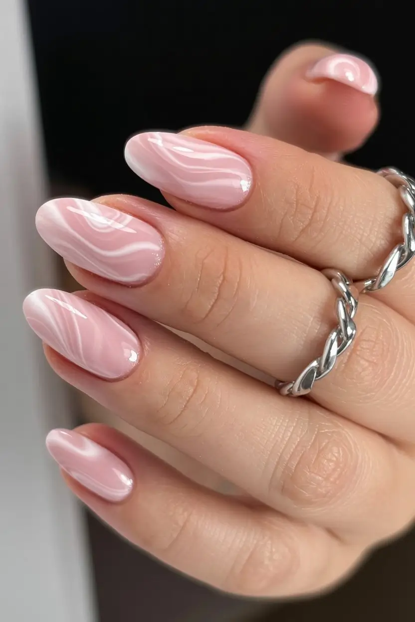 May Nails Ideas 2026 Soft Pink Marble Almond Nails for a Glossy Minimal Look