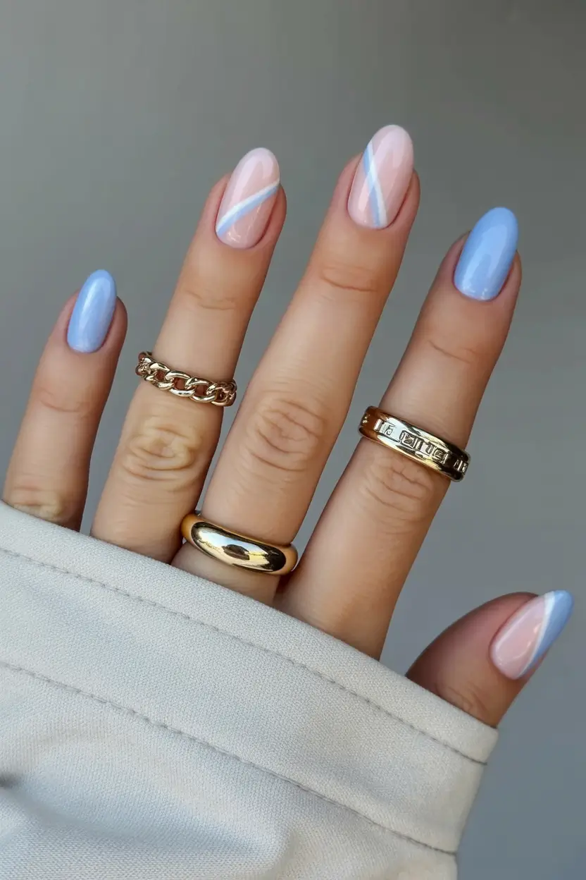 minimalist spring nails 2026 Pastel Blue and Pink Almond with Diagonal Lines