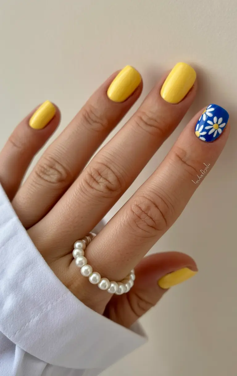 spring to summer season nail art ideas 2026 Sunny Daisy Accent Nails for Playful Summer Mood