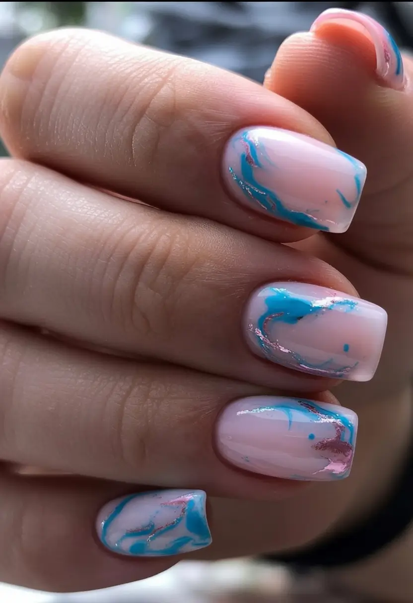 spring to summer season nails color ideas 2026 Ocean Inspired Marble for Dreamy Early Summer Nails