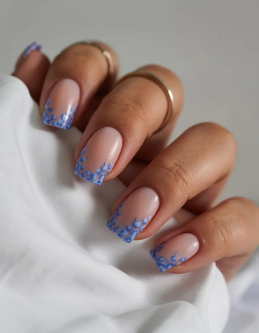 spring to summer season nails color ideas 2026 Minimal Blue Bubble Tips on Soft Nude Nails