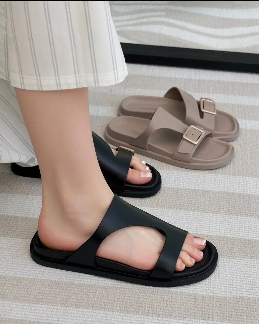 summer flip-flops for women 2026 Minimal black slides and quiet everyday luxury