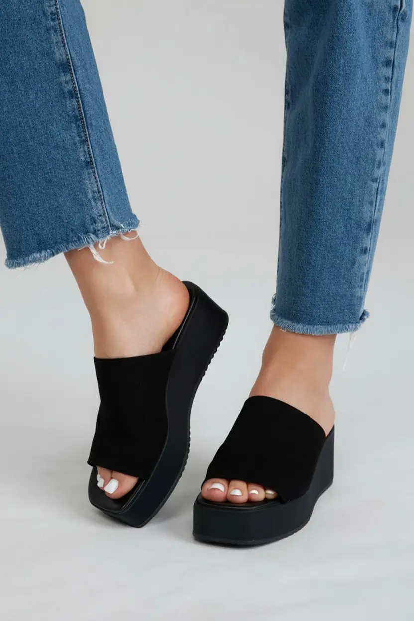 summer flip-flops for women 2026 Black platform slides and bold everyday confidence