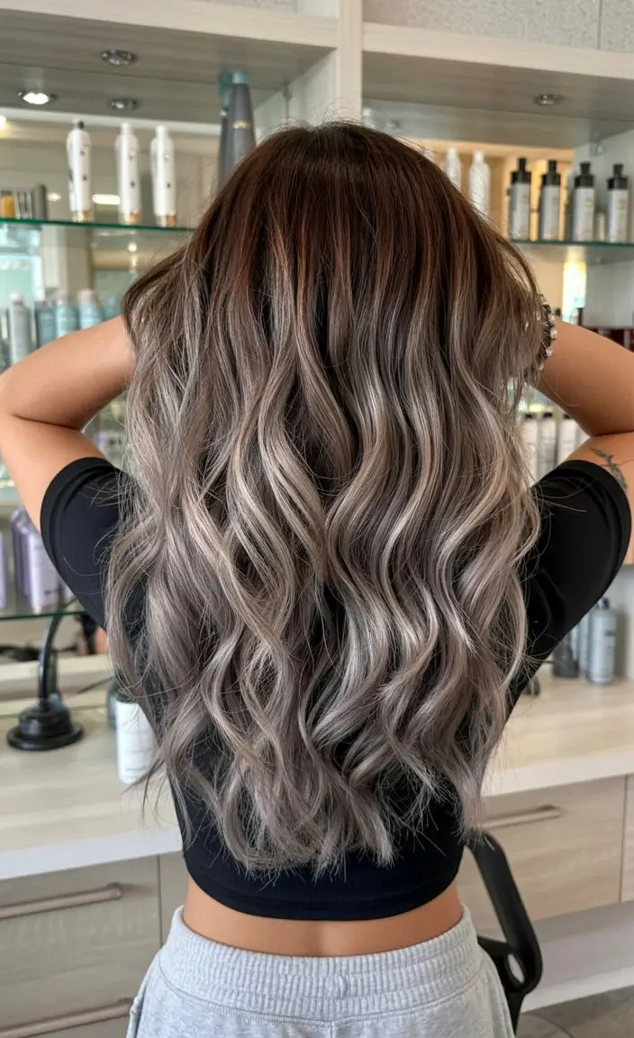 summer hair color ideas for brunettes 2026 chocolate Smoky Cool Blonde Blend with Dimensional Waves