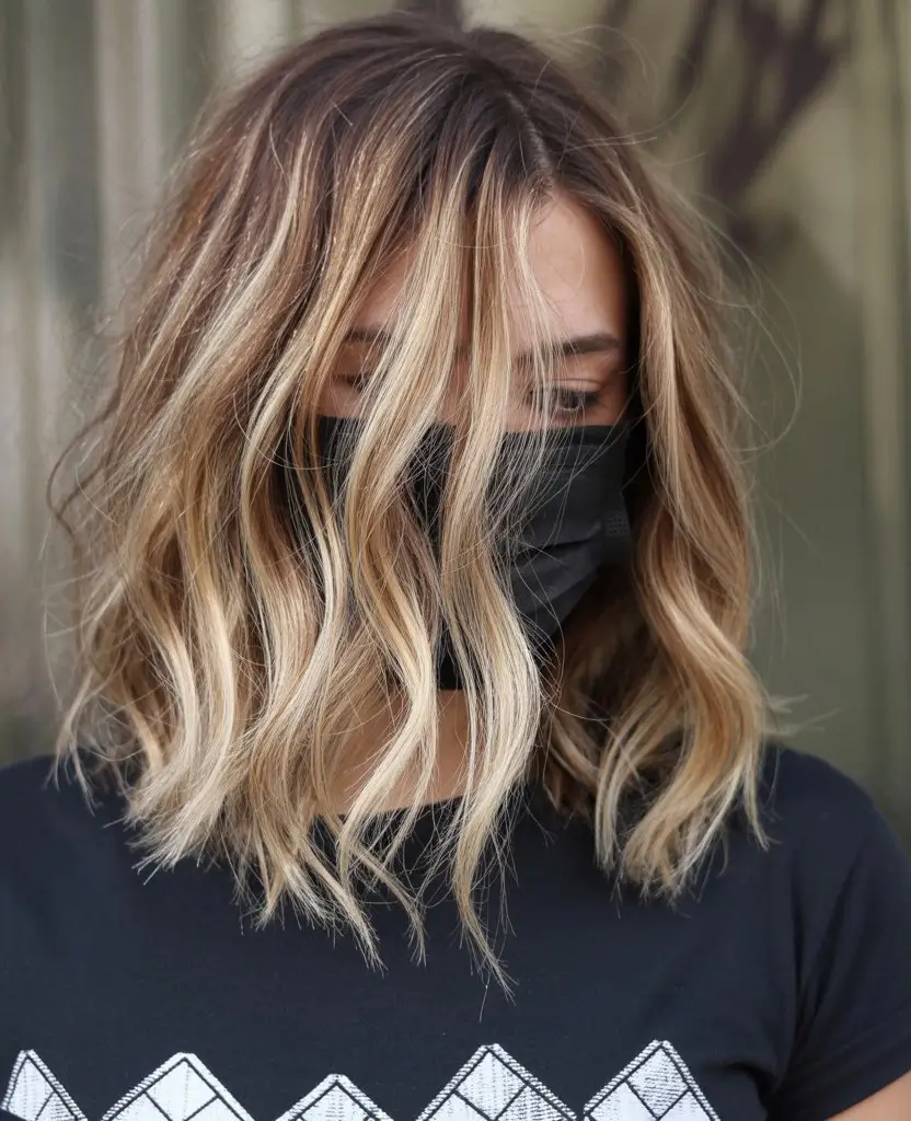 summer hair color ideas for brunettes 2026 chocolate Sunlit Caramel Waves on a Shoulder Length Cut