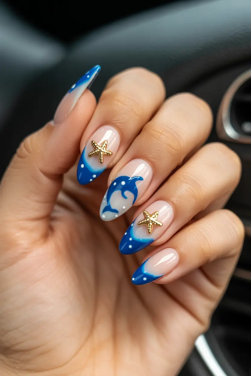 summer nail art ideas 2026 ocean theme Playful dolphin and starfish ocean story nails
