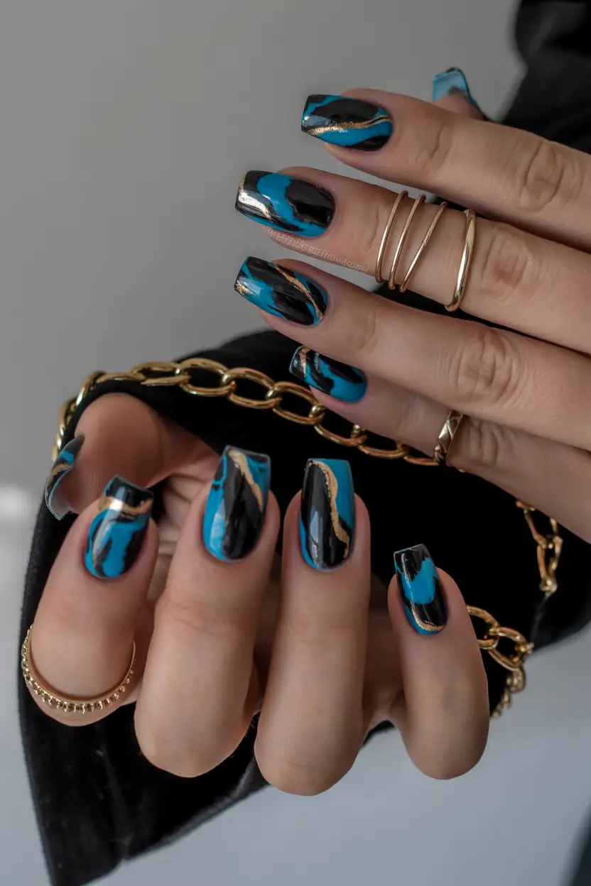 summer nail art ideas 2026 ocean theme Dark ocean marble with gold wave accents