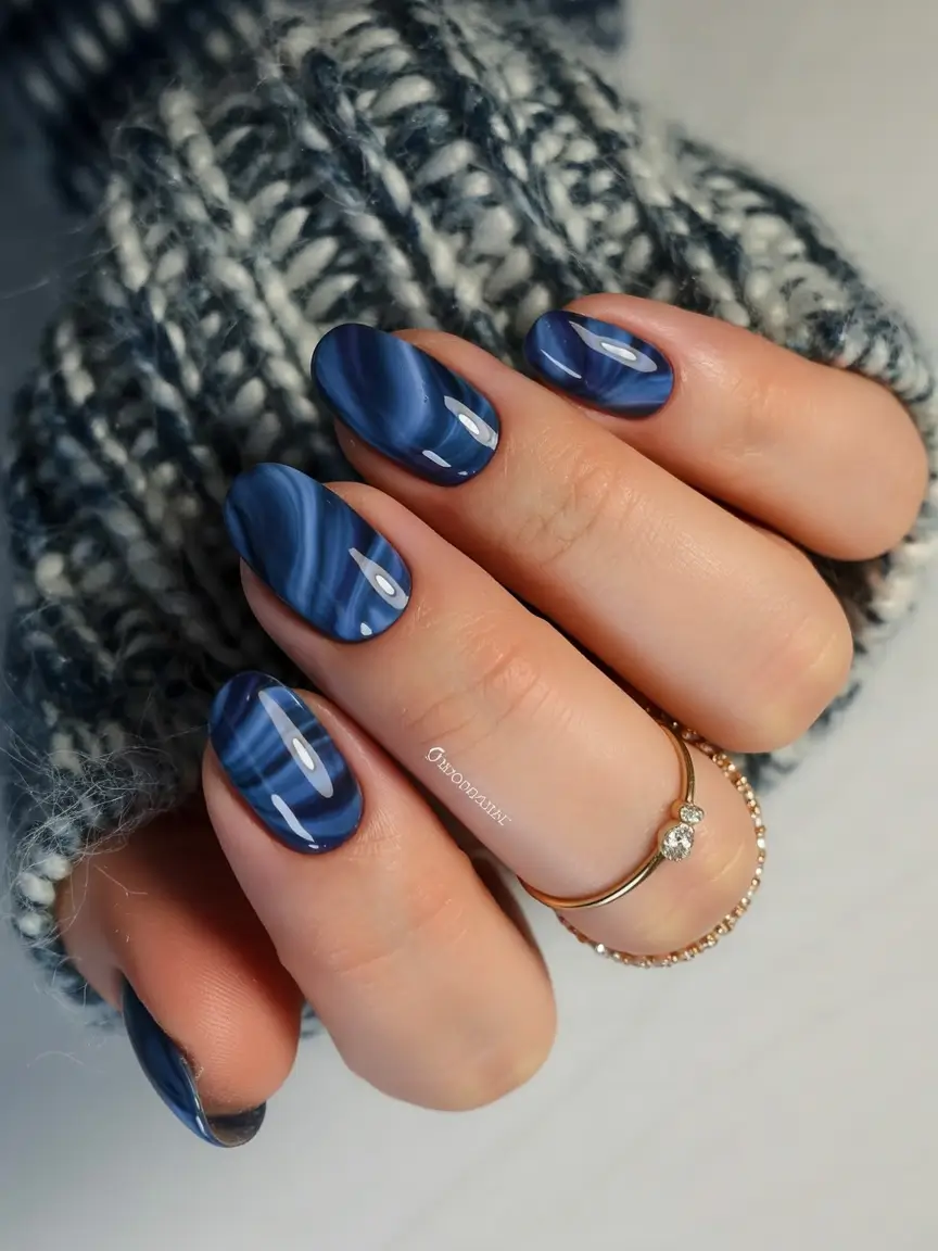 summer nail art ideas 2026 ocean theme Deep sea marble in glossy navy tones