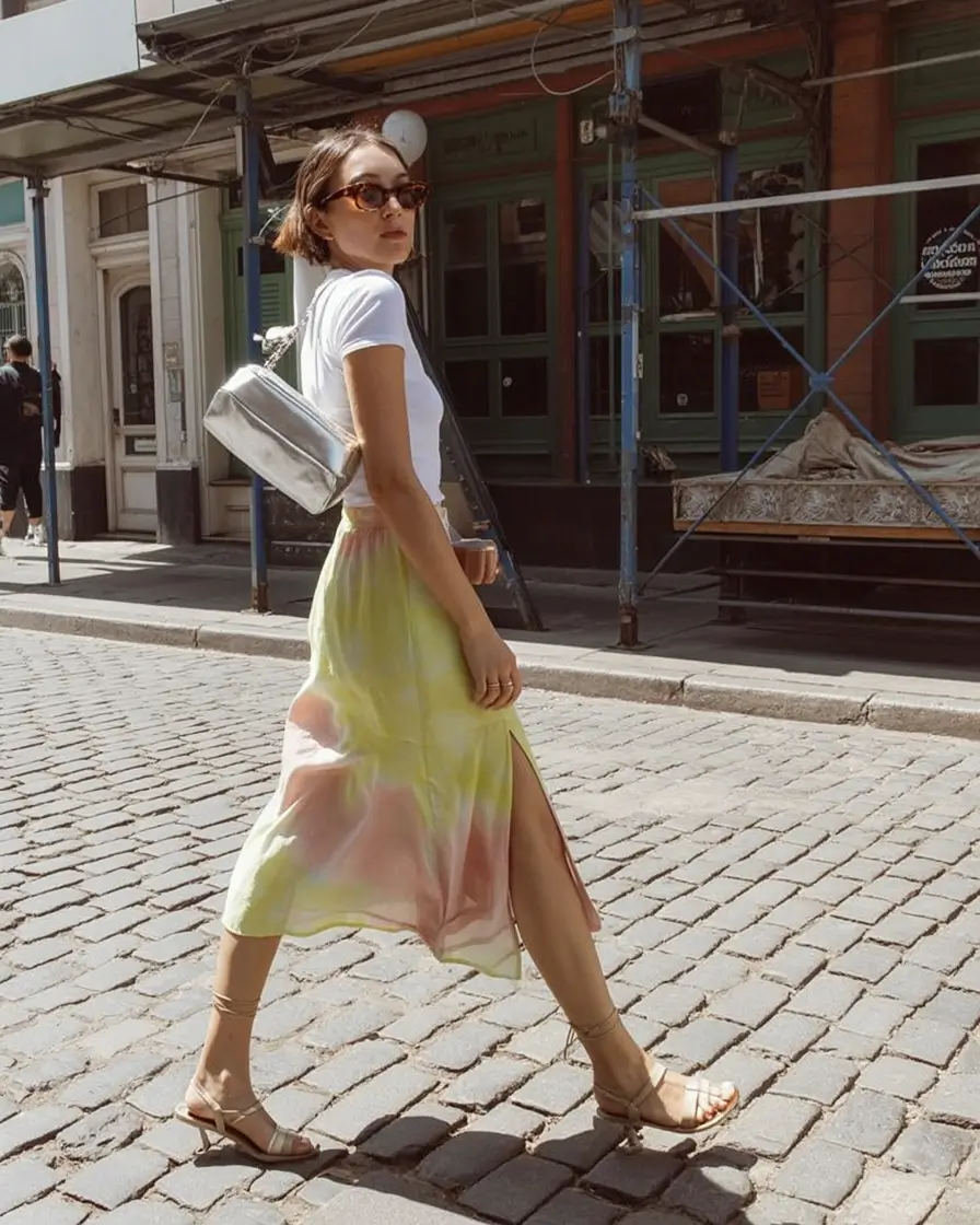 summer outfits with heels for women 2026 Flowy skirt and city walk confidence