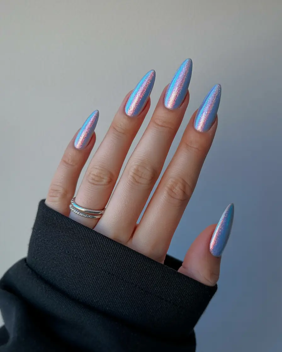 trending spring wedding nails 2026 Iridescent Blue Chrome Almond for a Bold Statement