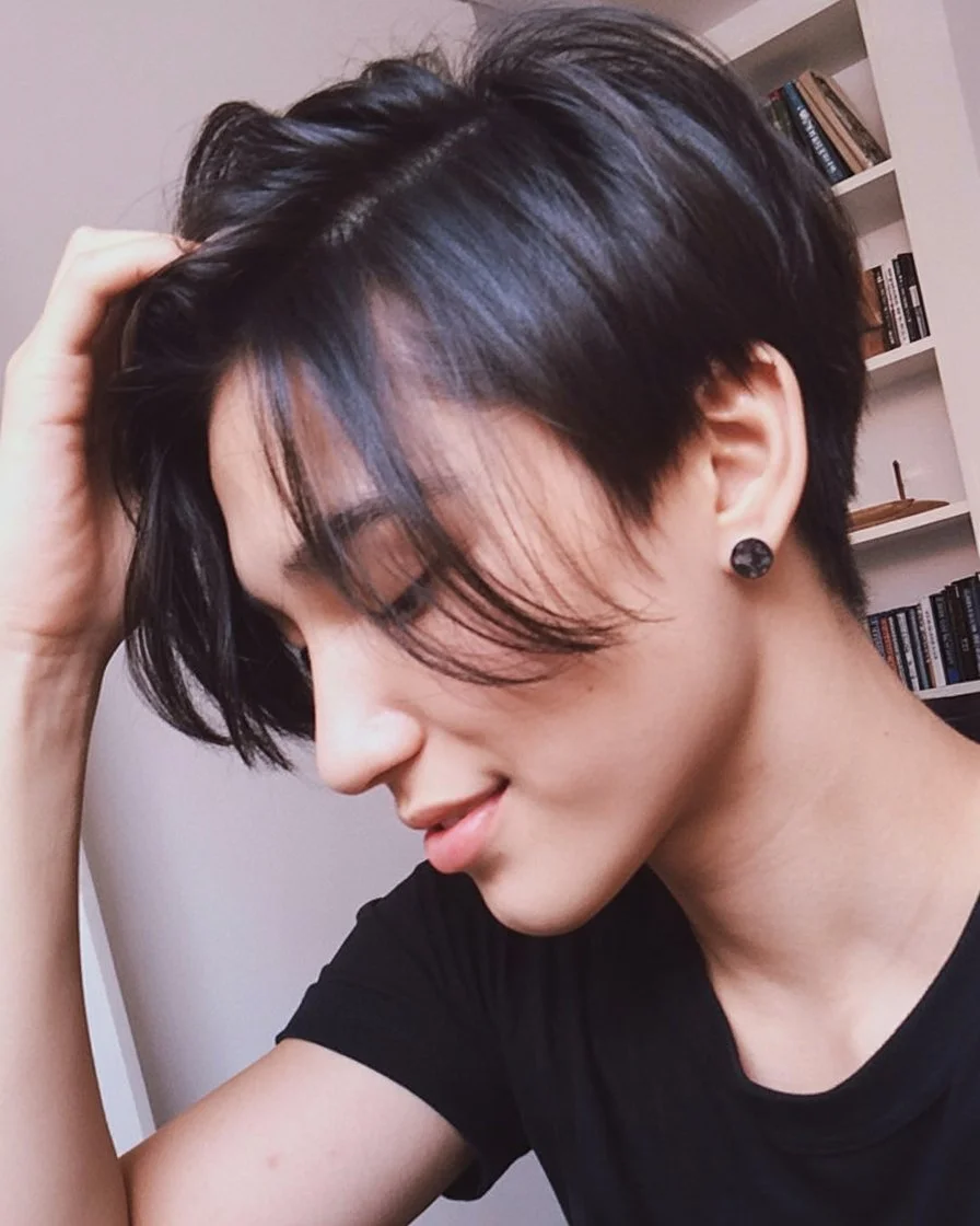 bold summer pixie haircuts 2026 Messy Black Pixie with Long Layers