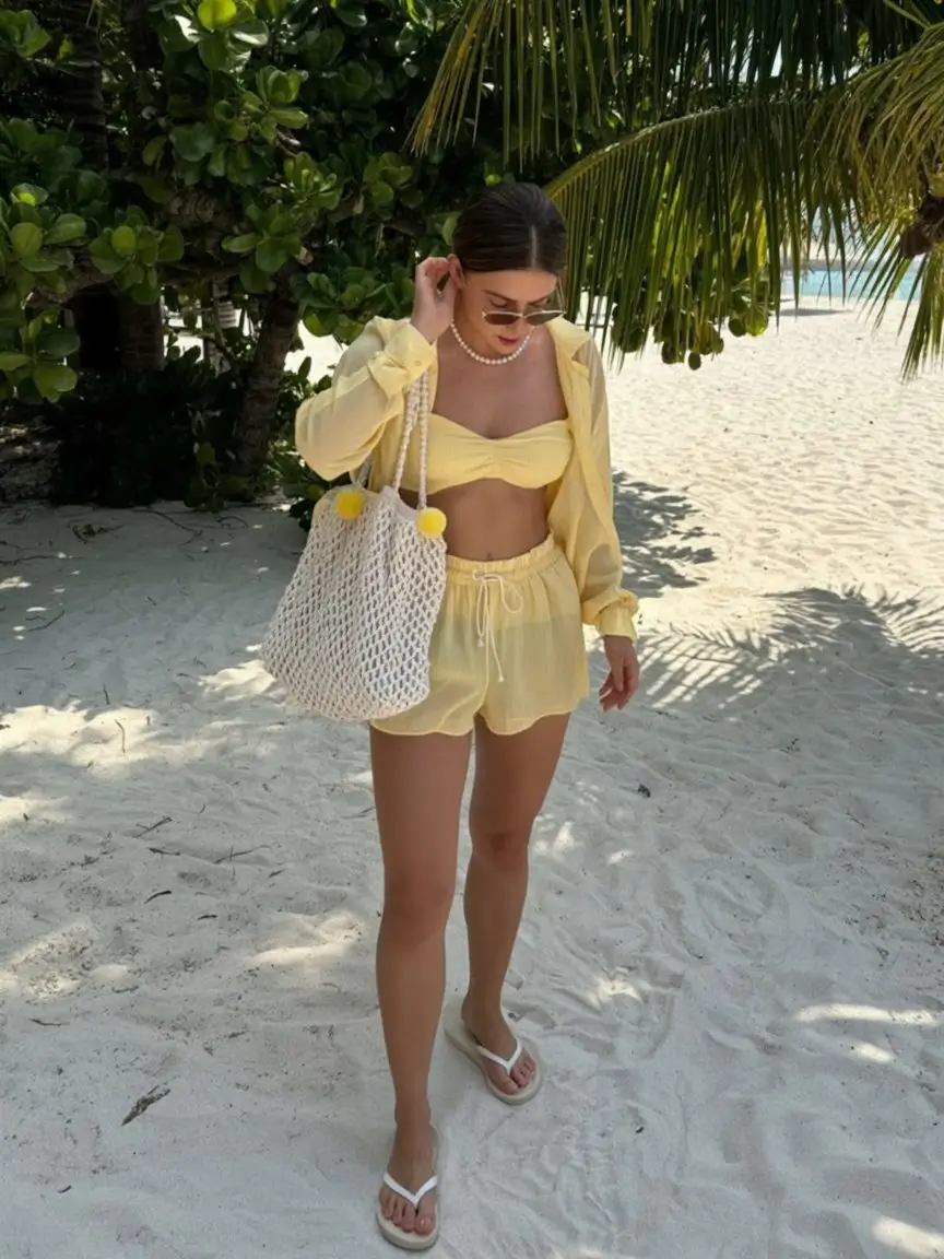 summer beach outfit for women 2026 Soft yellow beach set with playful feminine energy