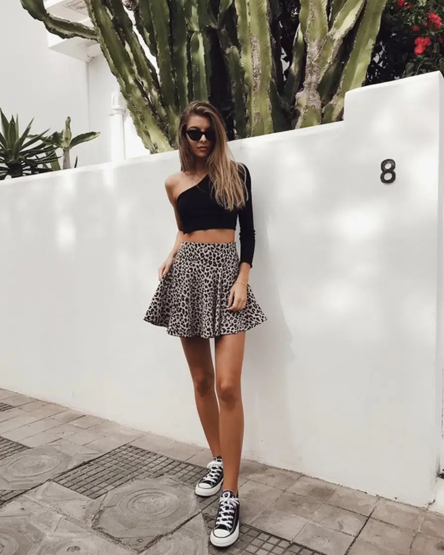 summer crop top outfits for women 2026 One shoulder crop top and leopard skirt bold playful outfit