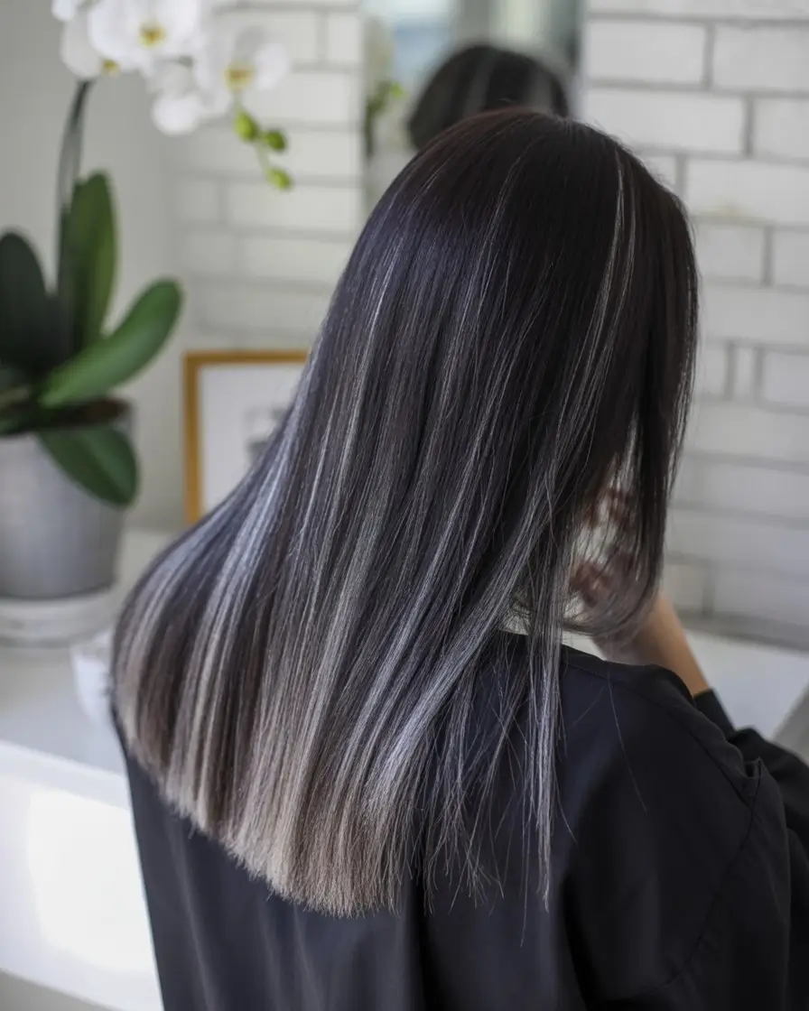 summer hair color ideas for women 2026 Cool toned black with subtle silver dimension