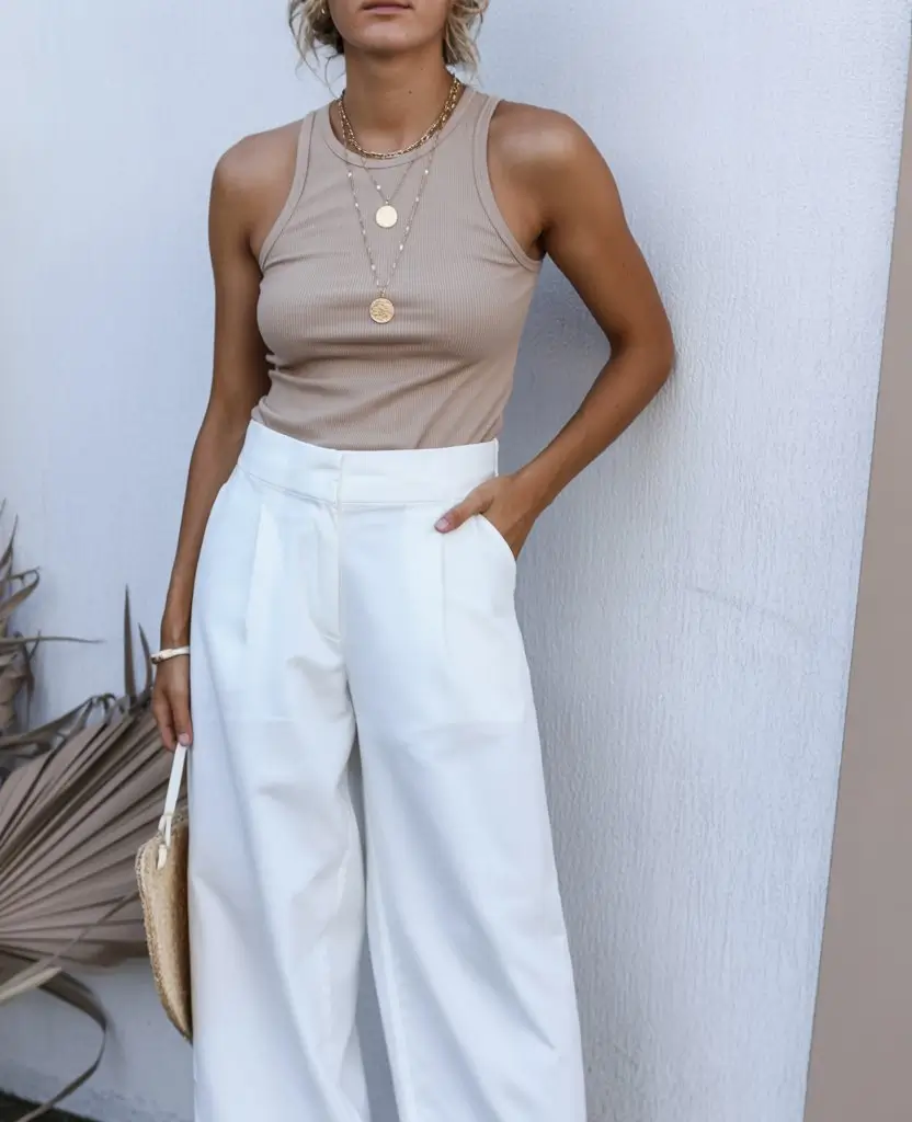 summer sleeveless tops for women 2026 Neutral ribbed tank with effortless wide leg tailoring