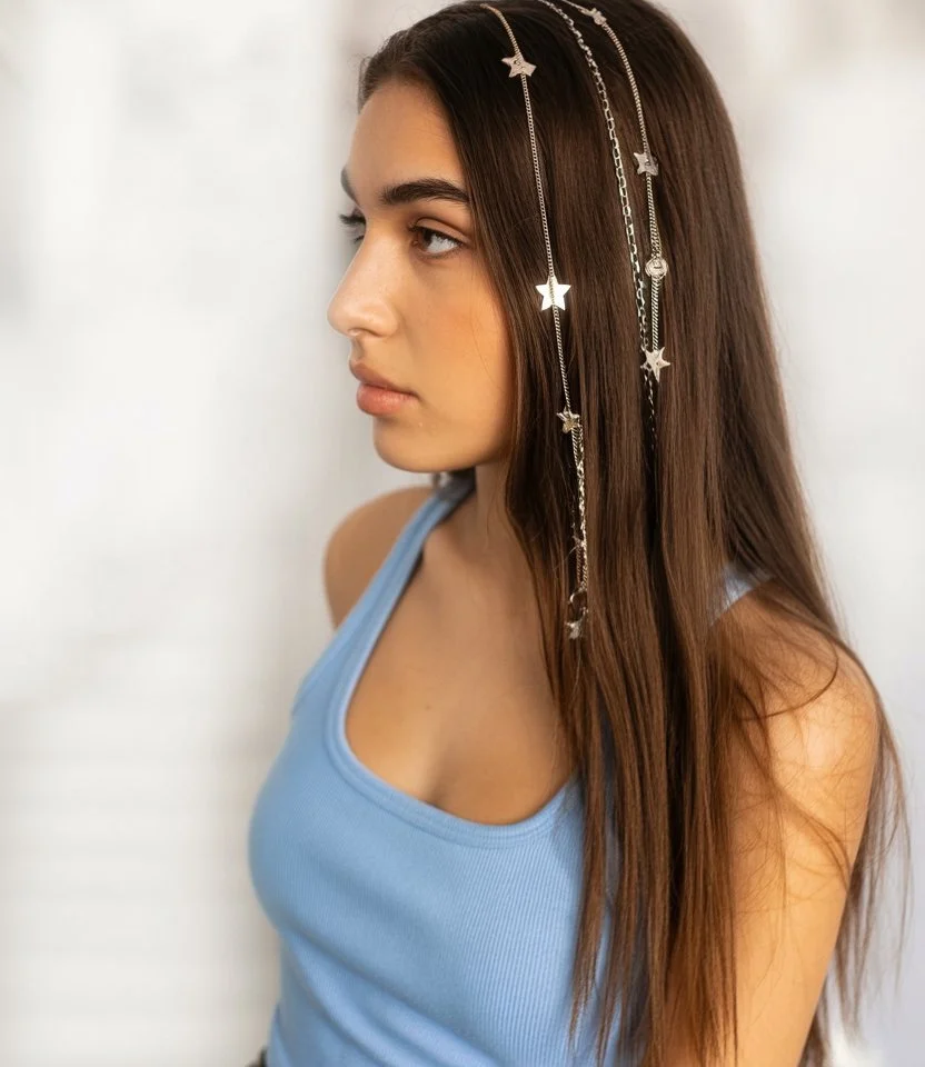 effortless summer quick hairstyles 2026 Star strand accents on sleek long hair