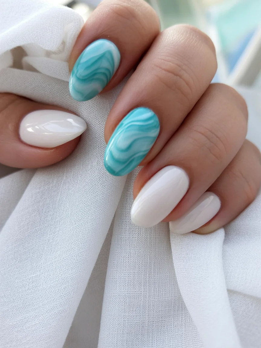 light summer nails 2026 Ocean Marble Blue Nail Art