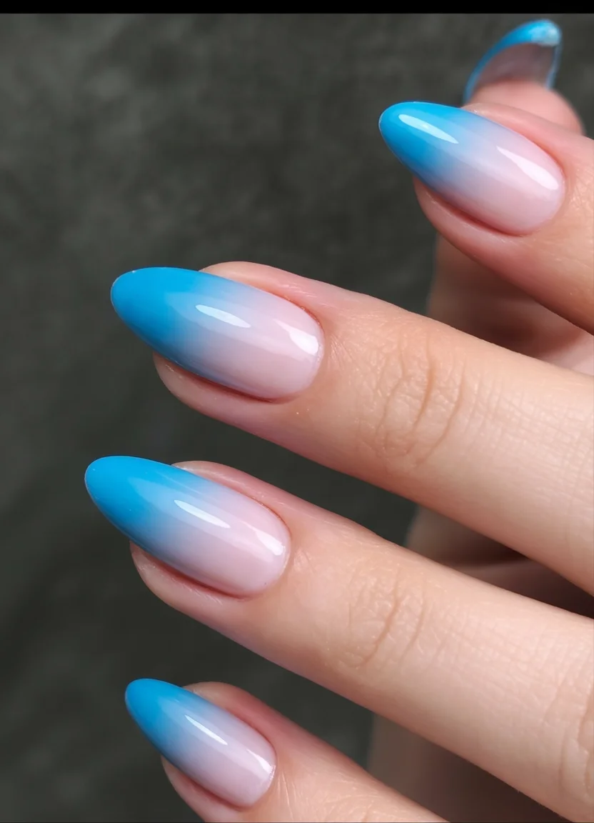 light summer nails 2026 Sky Blue Ombre Almond Nails
