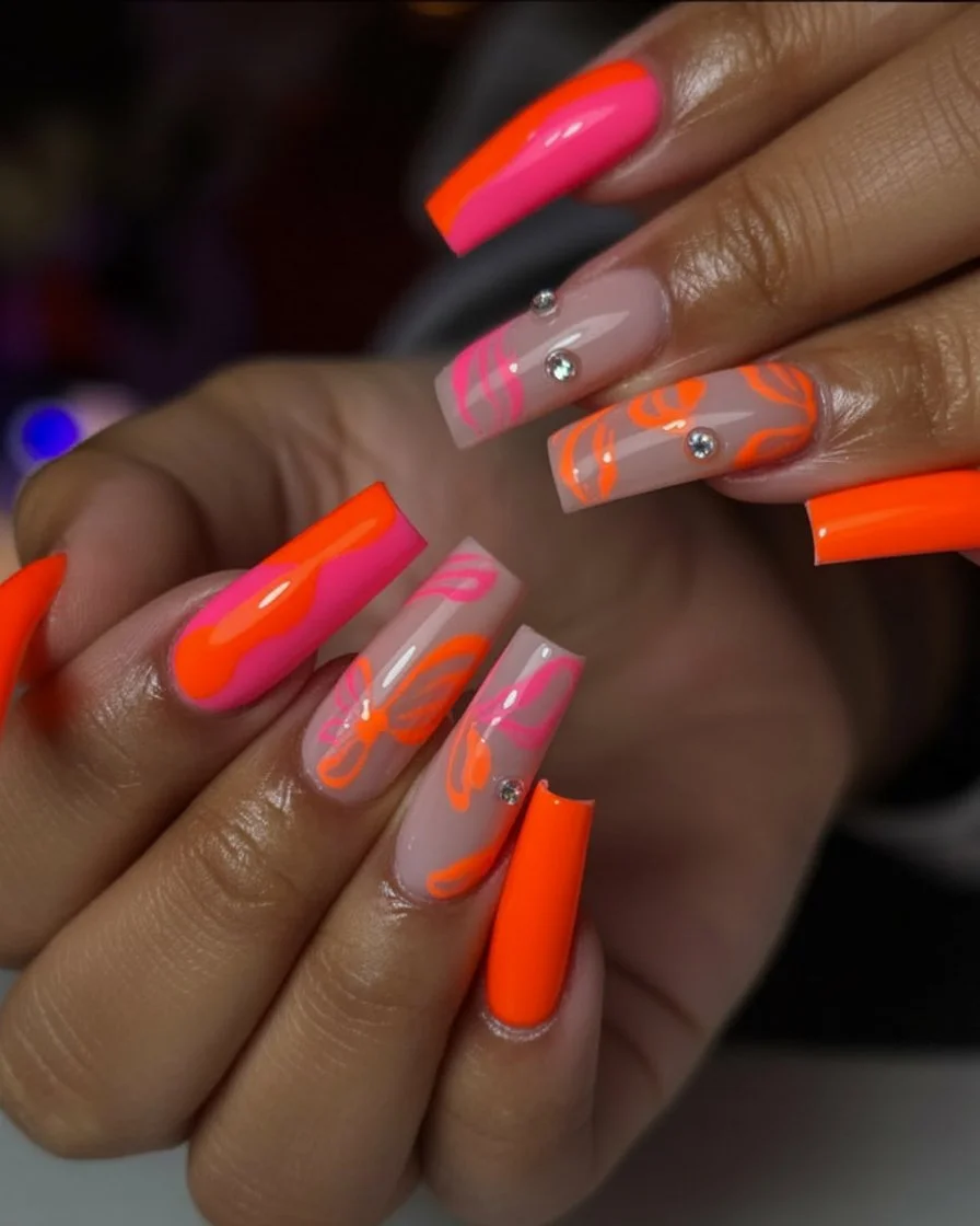 neon summer nails 2026 Hot Pink And Orange Butterfly Energy